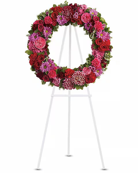 Floral wreath on a white stand